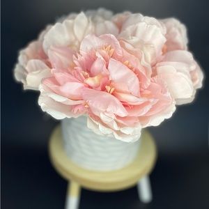 Delicate Harmony of Light Pink and Cream Peonies in a Textured White Pot